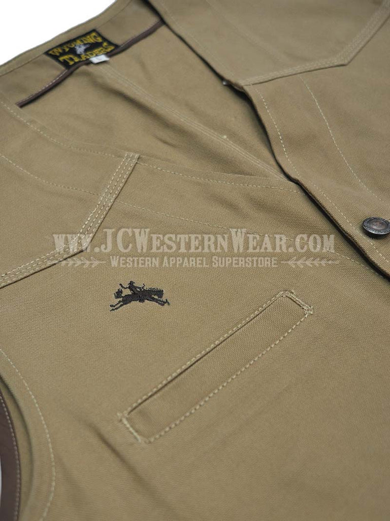 Wyoming Traders TEXAS Mens Concealed Carry Vest Tan on model. If you need any assistance with this item or the purchase of this item please call us at five six one seven four eight eight eight zero one Monday through Saturday 10:00a.m EST to 8:00 p.m EST