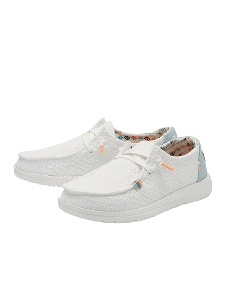 Hey Dude 121410164 Womens Wendy Boho Crochet Shoe White front-side view. If you need any assistance with this item or the purchase of this item please call us at five six one seven four eight eight eight zero one Monday through Saturday 10:00a.m EST to 8:00 p.m EST