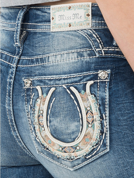 Miss Me M3881B Womens Mid Rise Boot Jean Horseshoe Medium Blue back view close up. If you need any assistance with this item or the purchase of this item please call us at five six one seven four eight eight eight zero one Monday through Saturday 10:00a.m EST to 8:00 p.m EST
