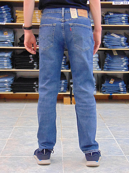 Levi's 295070391 Regular Taper Fit Pauper Tencel Stretch Jean Denim Blue back view. If you need any assistance with this item or the purchase of this item please call us at five six one seven four eight eight eight zero one Monday through Saturday 10:00a.m EST to 8:00 p.m EST