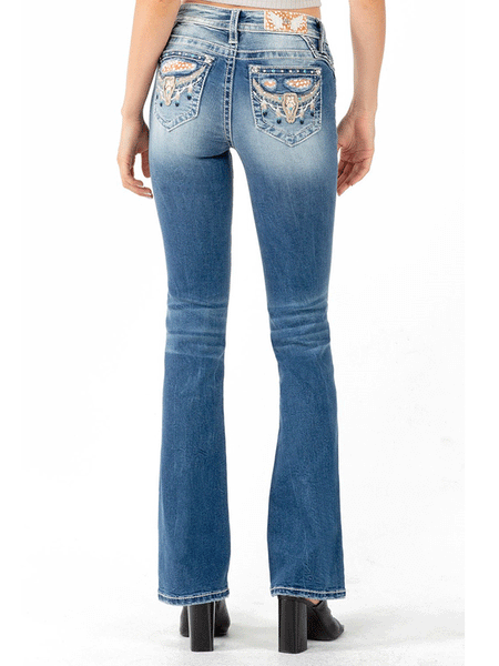 Miss Me M3857B Womens Mid-Rise Boot Jean Medium Blue back view. If you need any assistance with this item or the purchase of this item please call us at five six one seven four eight eight eight zero one Monday through Saturday 10:00a.m EST to 8:00 p.m EST