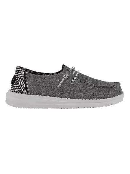 Hey Dude 130124203 Youth Wendy Shoe Chambray Onyx side view. If you need any assistance with this item or the purchase of this item please call us at five six one seven four eight eight eight zero one Monday through Saturday 10:00a.m EST to 8:00 p.m EST