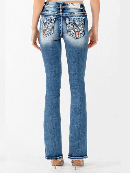 Miss Me M3849B Womens US Flag Pocket Mid-Rise Bootcut Jean Dark Blue back view. If you need any assistance with this item or the purchase of this item please call us at five six one seven four eight eight eight zero one Monday through Saturday 10:00a.m EST to 8:00 p.m EST
