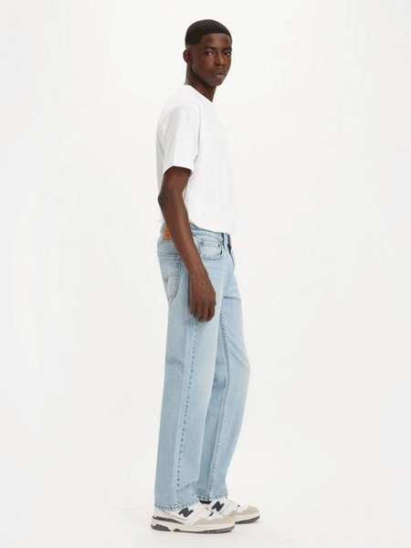 Levis 005141705 Mens 514 Straight Fit Jeans Medium Indigo Stonewash Blue side view. If you need any assistance with this item or the purchase of this item please call us at five six one seven four eight eight eight zero one Monday through Saturday 10:00a.m EST to 8:00 p.m EST