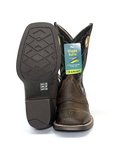 Ariat 10016239 Kids Heritage Roughstock Western Boot Distressed Brown sole and front view. If you need any assistance with this item or the purchase of this item please call us at five six one seven four eight eight eight zero one Monday through Saturday 10:00a.m EST to 8:00 p.m EST