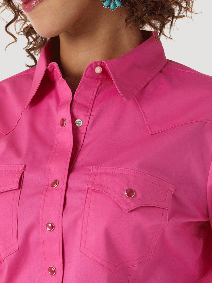 Wrangler LW1003K Ladies Western Long Sleeve Solid Shirt Pink front view  If you need any assistance with this item or the purchase of this item please call us at five six one seven four eight eight eight zero one Monday through Satuday 10:00 a.m. EST to 8:00 p.m. EST