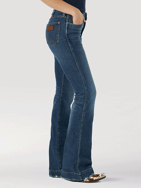 Wrangler 1011MPEHL Womens Green Jean-Eco-Friendly High Rise Trouser Lauren side view. If you need any assistance with this item or the purchase of this item please call us at five six one seven four eight eight eight zero one Monday through Saturday 10:00a.m EST to 8:00 p.m EST