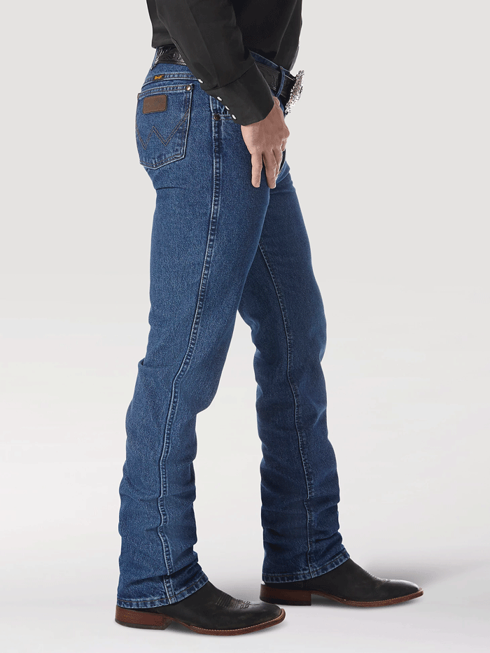 Wrangler 36MWZDS Premium Performance Cowboy Cut Slim Fit Jean Dark Stone front view. If you need any assistance with this item or the purchase of this item please call us at five six one seven four eight eight eight zero one Monday through Saturday 10:00a.m EST to 8:00 p.m EST