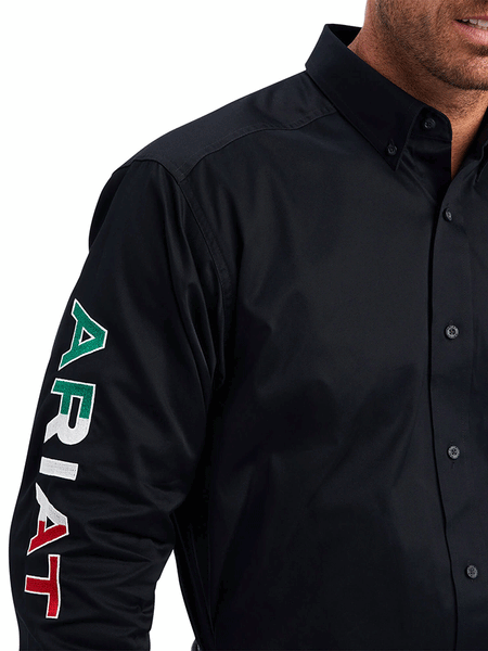 Ariat 10038500 Mens Team Logo Twill Classic Fit Shirt Mexico Black arm logo detail. If you need any assistance with this item or the purchase of this item please call us at five six one seven four eight eight eight zero one Monday through Saturday 10:00a.m EST to 8:00 p.m EST