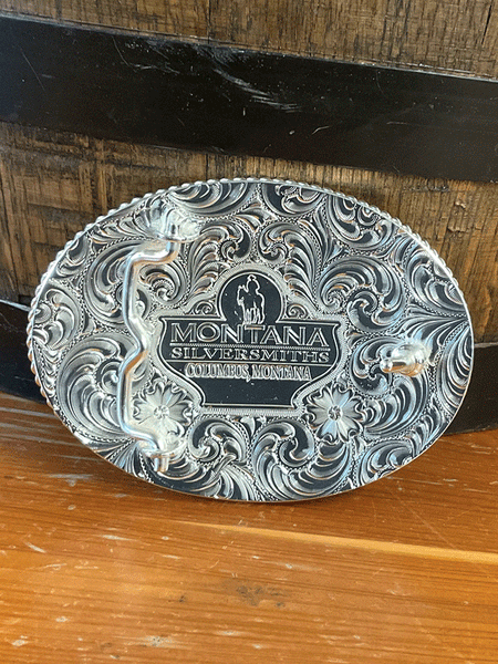 Montana Silversmiths 6250-931L Etched Mountains Ridin' For The Brand Cowboy Buckle Silver back view. If you need any assistance with this item or the purchase of this item please call us at five six one seven four eight eight eight zero one Monday through Saturday 10:00a.m EST to 8:00 p.m EST