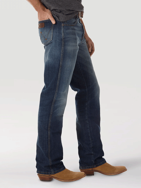 Wrangler WRT20JH Mens Retro Relaxed Fit Bootcut JH Wash side view. If you need any assistance with this item or the purchase of this item please call us at five six one seven four eight eight eight zero one Monday through Saturday 10:00a.m EST to 8:00 p.m EST