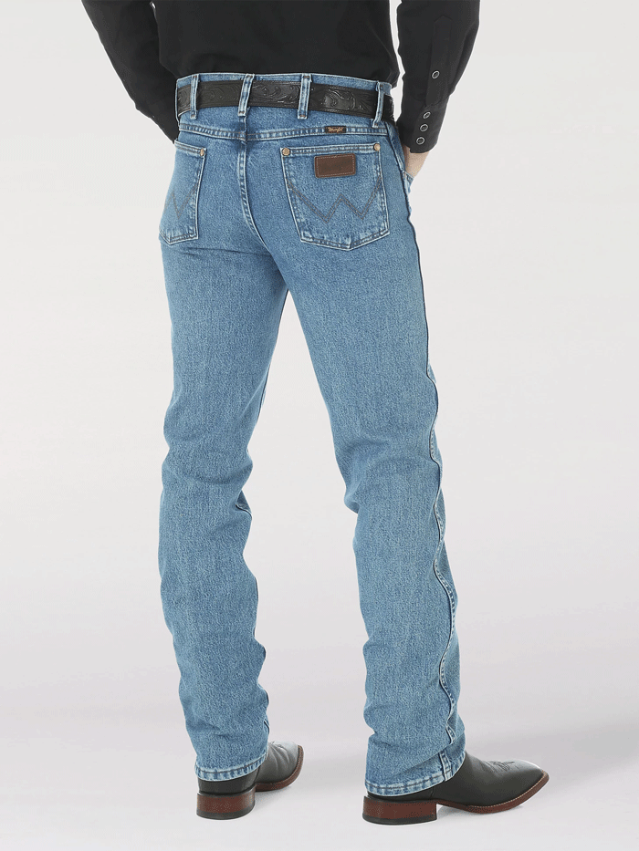 Wrangler 1036MWZSW Mens Premium Performance Cowboy Cut Slim Fit Jean Stonewash front view. If you need any assistance with this item or the purchase of this item please call us at five six one seven four eight eight eight zero one Monday through Saturday 10:00a.m EST to 8:00 p.m EST