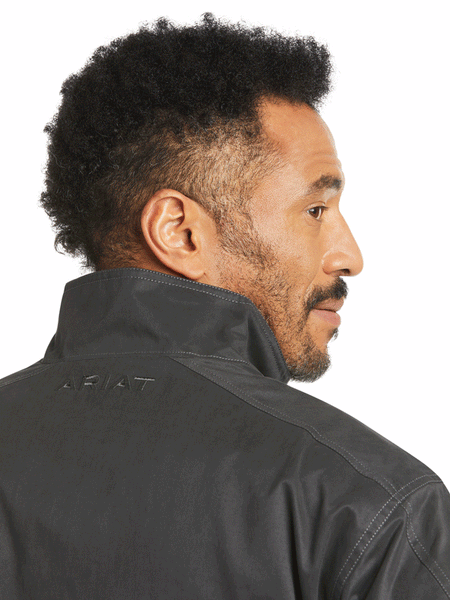 Ariat 10037499 Mens Grizzly Canvas Concealed Carry Lightweight Jacket Phantom back collar close up. If you need any assistance with this item or the purchase of this item please call us at five six one seven four eight eight eight zero one Monday through Saturday 10:00a.m EST to 8:00 p.m EST