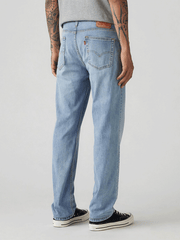 Levis 005141965 Mens 514 Straight Fit Jeans Light Blue back view. If you need any assistance with this item or the purchase of this item please call us at five six one seven four eight eight eight zero one Monday through Saturday 10:00a.m EST to 8:00 p.m EST