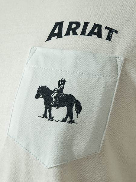 Ariat 10058882 Mens Echo Valley Pocket T-Shirt Quiet Ride Light Blue chest pocket close up. If you need any assistance with this item or the purchase of this item please call us at five six one seven four eight eight eight zero one Monday through Saturday 10:00a.m EST to 8:00 p.m EST