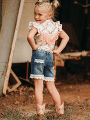 Shea Baby WRSB10 Kids Floral Boot Onesie Shirt With Fringe White back view toddler model. If you need any assistance with this item or the purchase of this item please call us at five six one seven four eight eight eight zero one Monday through Saturday 10:00a.m EST to 8:00 p.m EST