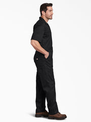Dickies 33274DN Mens FLEX Short Sleeve Coveralls Nark Navy side view. If you need any assistance with this item or the purchase of this item please call us at five six one seven four eight eight eight zero one Monday through Saturday 10:00a.m EST to 8:00 p.m EST