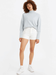 Levi's 299650067 Womens Mid Length Denim Shorts Chalk White full front view on model. If you need any assistance with this item or the purchase of this item please call us at five six one seven four eight eight eight zero one Monday through Saturday 10:00a.m EST to 8:00 p.m EST