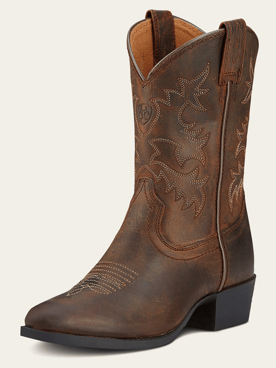 Ariat 10001825 Youth Heritage Western Boot Distressed Brown front and side view. If you need any assistance with this item or the purchase of this item please call us at five six one seven four eight eight eight zero one Monday through Saturday 10:00a.m EST to 8:00 p.m EST
