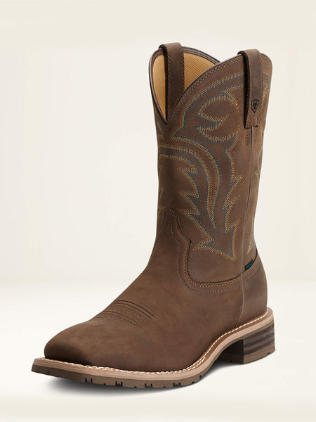 Ariat 10014067 Mens Hybrid Rancher Waterproof Western Boot Oily Distressed Brown front and side view. If you need any assistance with this item or the purchase of this item please call us at five six one seven four eight eight eight zero one Monday through Saturday 10:00a.m EST to 8:00 p.m EST