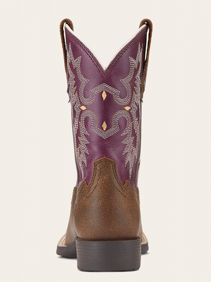 Ariat 10015390 Youth Tombstone Wide Square Toe Western Boot Brown front and side view. If you need any assistance with this item or the purchase of this item please call us at five six one seven four eight eight eight zero one Monday through Saturday 10:00a.m EST to 8:00 p.m EST

