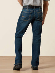 Ariat 10016220 Mens Rebar M4 Relaxed DuraStretch Edge Boot Cut Jean Bodie Navy back view. If you need any assistance with this item or the purchase of this item please call us at five six one seven four eight eight eight zero one Monday through Saturday 10:00a.m EST to 8:00 p.m EST
