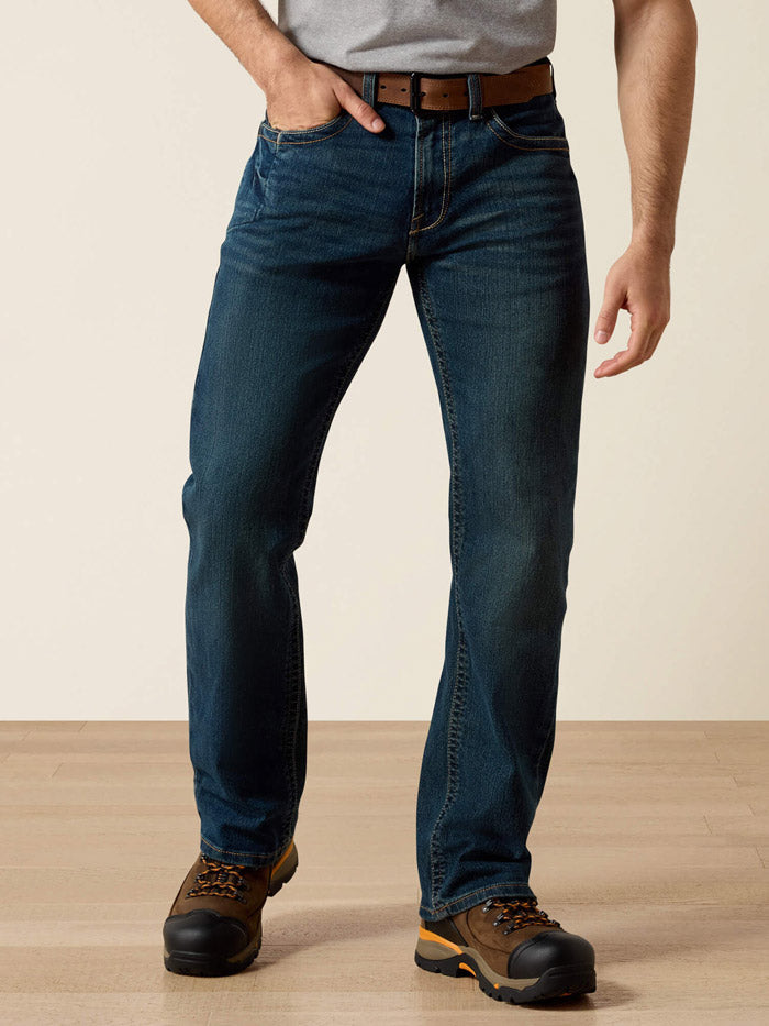 Ariat 10016220 Mens Rebar M4 Relaxed DuraStretch Edge Boot Cut Jean Bodie Navy front view. If you need any assistance with this item or the purchase of this item please call us at five six one seven four eight eight eight zero one Monday through Saturday 10:00a.m EST to 8:00 p.m EST
