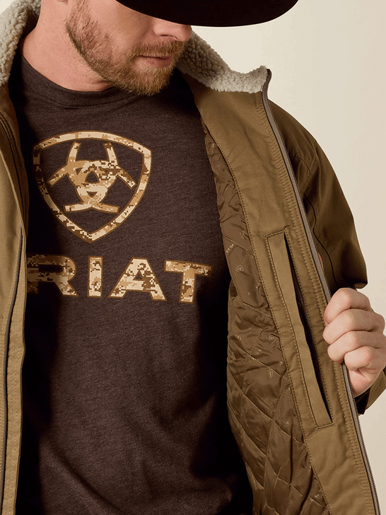 Ariat 10028399 Mens Grizzly Canvas Concealed Carry Jacket Cub inside close up. If you need any assistance with this item or the purchase of this item please call us at five six one seven four eight eight eight zero one Monday through Saturday 10:00a.m EST to 8:00 p.m EST