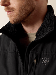 Ariat 10041631 Mens Grizzly Canvas Concealed Carry Jacket Black collar view. If you need any assistance with this item or the purchase of this item please call us at five six one seven four eight eight eight zero one Monday through Saturday 10:00a.m EST to 8:00 p.m EST