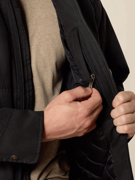 Ariat 10041631 Mens Grizzly Canvas Concealed Carry Jacket Black inside pocket view. If you need any assistance with this item or the purchase of this item please call us at five six one seven four eight eight eight zero one Monday through Saturday 10:00a.m EST to 8:00 p.m EST

