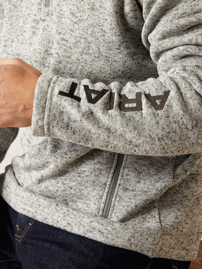 Ariat 10046490 Mens Caldwell Logo Zip Sweater Nulla Heather front view. If you need any assistance with this item or the purchase of this item please call us at five six one seven four eight eight eight zero one Monday through Saturday 10:00a.m EST to 8:00 p.m EST