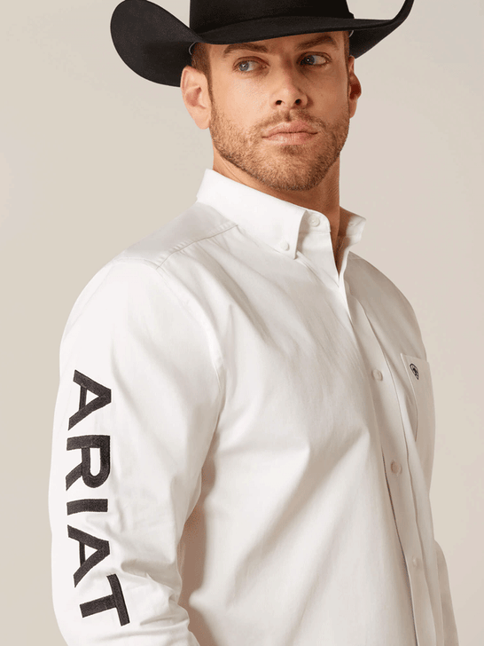 Ariat 10046825 Mens Team Logo Twill Classic Fit Shirt White sleeve view. If you need any assistance with this item or the purchase of this item please call us at five six one seven four eight eight eight zero one Monday through Saturday 10:00a.m EST to 8:00 p.m EST