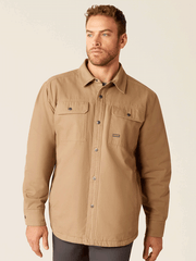 Ariat 10052426 Mens Rebar Canvas Shirt Jacket Khaki front view. If you need any assistance with this item or the purchase of this item please call us at five six one seven four eight eight eight zero one Monday through Saturday 10:00a.m EST to 8:00 p.m EST