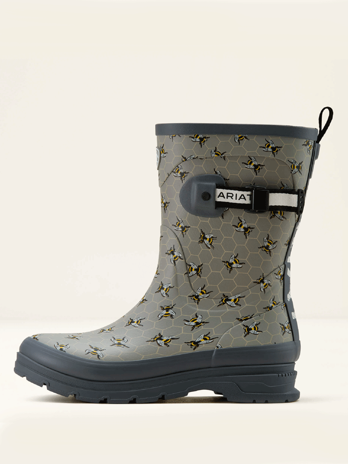 Ariat 10061227 Womens Kelmarsh Mid Rubber Boot Bee Print Grey side / front view. If you need any assistance with this item or the purchase of this item please call us at five six one seven four eight eight eight zero one Monday through Saturday 10:00a.m EST to 8:00 p.m EST