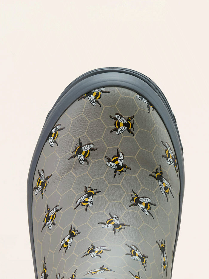 Ariat 10061227 Womens Kelmarsh Mid Rubber Boot Bee Print Grey side / front view. If you need any assistance with this item or the purchase of this item please call us at five six one seven four eight eight eight zero one Monday through Saturday 10:00a.m EST to 8:00 p.m EST