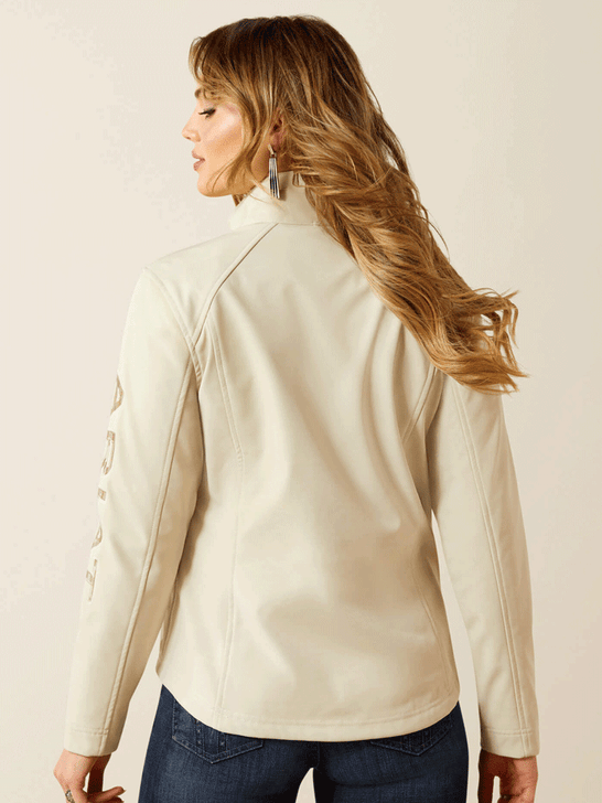 Ariat 10062306 Womens Team Logo Softshell Jacket Cream back view. If you need any assistance with this item or the purchase of this item please call us at five six one seven four eight eight eight zero one Monday through Saturday 10:00a.m EST to 8:00 p.m EST