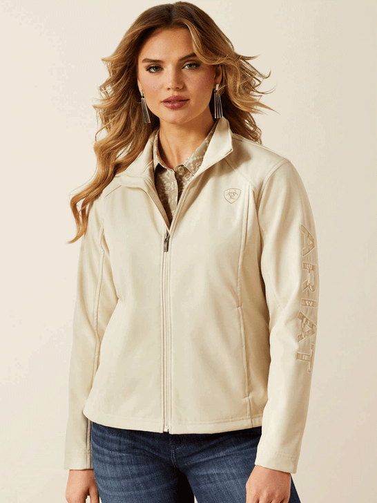 Ariat 10062306 Womens Team Logo Softshell Jacket Cream front view. If you need any assistance with this item or the purchase of this item please call us at five six one seven four eight eight eight zero one Monday through Saturday 10:00a.m EST to 8:00 p.m EST
