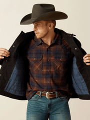 Ariat 10062438 Mens Canvas Rancher Jacket Black inside view. If you need any assistance with this item or the purchase of this item please call us at five six one seven four eight eight eight zero one Monday through Saturday 10:00a.m EST to 8:00 p.m EST