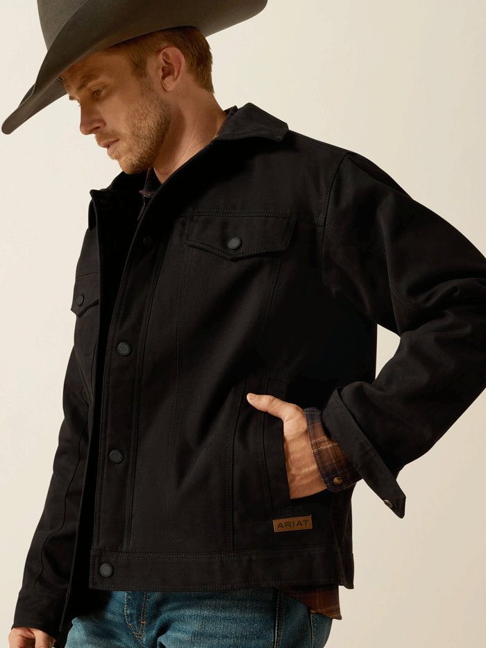 Ariat 10062438 Mens Canvas Rancher Jacket Black front view. If you need any assistance with this item or the purchase of this item please call us at five six one seven four eight eight eight zero one Monday through Saturday 10:00a.m EST to 8:00 p.m EST