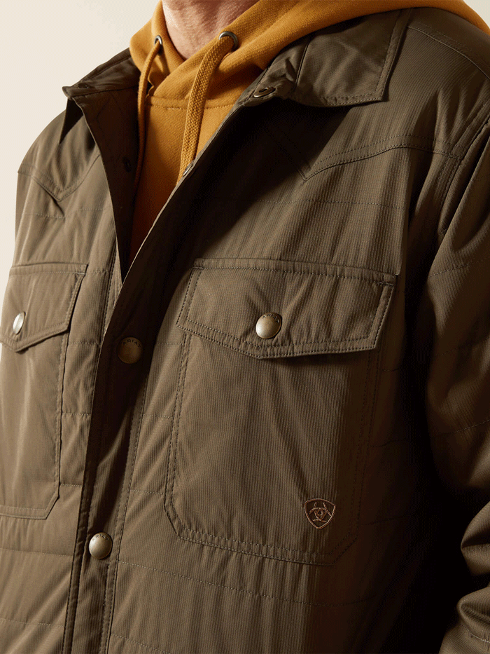 Ariat 10062512 Mens Quilted Shirt Jacket Dark Olive Green front view. If you need any assistance with this item or the purchase of this item please call us at five six one seven four eight eight eight zero one Monday through Saturday 10:00a.m EST to 8:00 p.m EST