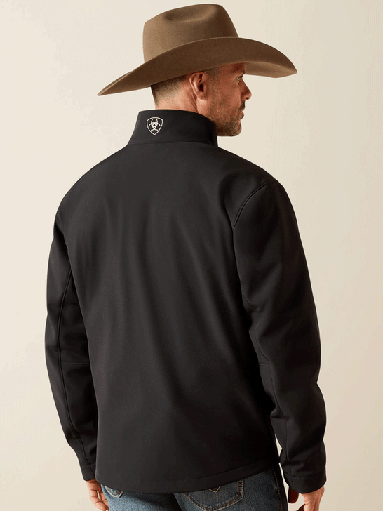Ariat 10062578 Mens Logo Softshell Jacket Black back view. If you need any assistance with this item or the purchase of this item please call us at five six one seven four eight eight eight zero one Monday through Saturday 10:00a.m EST to 8:00 p.m EST