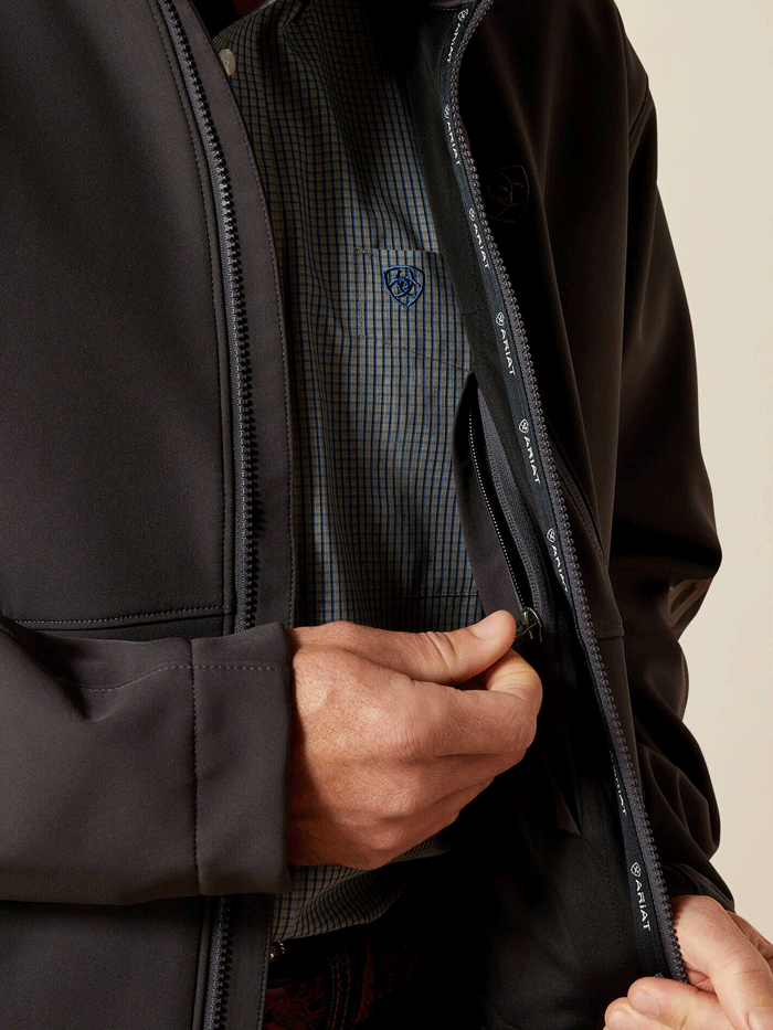 Ariat 10062580 Mens Logo Softshell Jacket Phantom front view. If you need any assistance with this item or the purchase of this item please call us at five six one seven four eight eight eight zero one Monday through Saturday 10:00a.m EST to 8:00 p.m EST