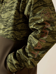 Ariat 10062582 Mens Logo Softshell Jacket Earth Green Camo sleeve view. If you need any assistance with this item or the purchase of this item please call us at five six one seven four eight eight eight zero one Monday through Saturday 10:00a.m EST to 8:00 p.m EST
