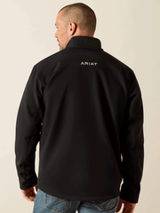 Ariat 10062596 Mens Vernon Softshell Jacket Black back view. If you need any assistance with this item or the purchase of this item please call us at five six one seven four eight eight eight zero one Monday through Saturday 10:00a.m EST to 8:00 p.m EST