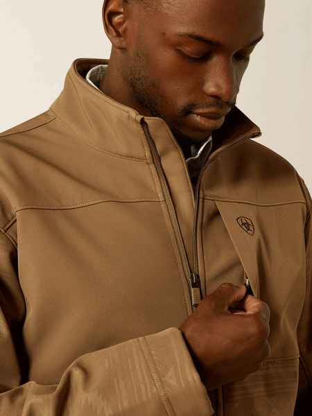 Ariat 10062599 Mens Vernon Softshell Jacket Khaki Southwest front close up. If you need any assistance with this item or the purchase of this item please call us at five six one seven four eight eight eight zero one Monday through Saturday 10:00a.m EST to 8:00 p.m EST