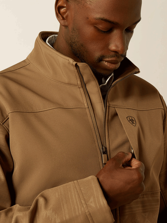 Ariat 10062599 Mens Vernon Softshell Jacket Khaki Southwest front close up. If you need any assistance with this item or the purchase of this item please call us at five six one seven four eight eight eight zero one Monday through Saturday 10:00a.m EST to 8:00 p.m EST