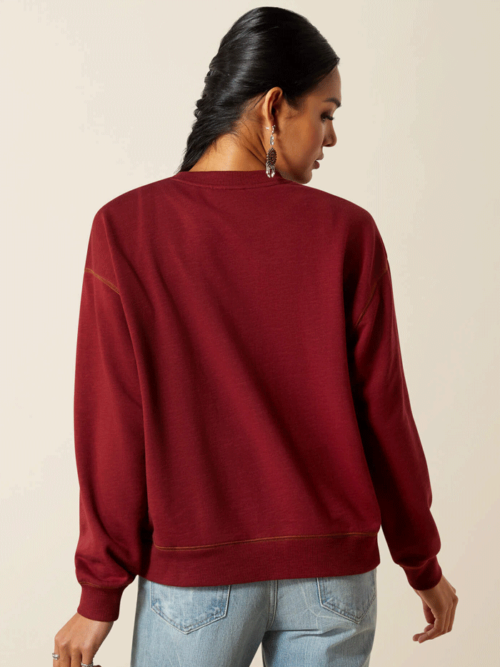 Ariat 10062799 Womens Lasso Sweatshirt Cabarnet Burgundy front view. If you need any assistance with this item or the purchase of this item please call us at five six one seven four eight eight eight zero one Monday through Saturday 10:00a.m EST to 8:00 p.m EST