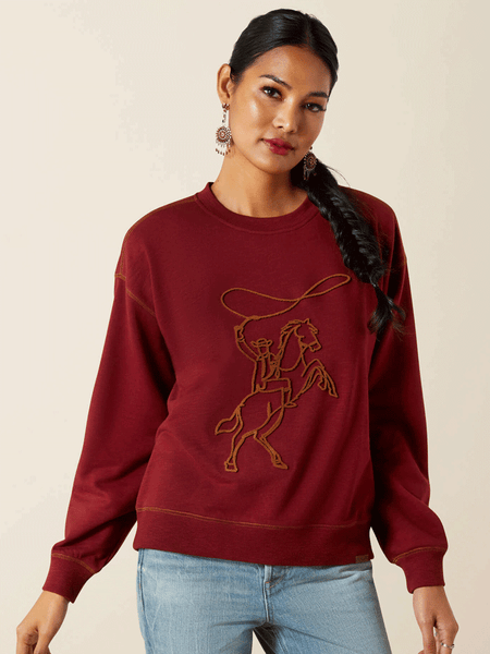 Ariat 10062799 Womens Lasso Sweatshirt Cabarnet Burgundy front view. If you need any assistance with this item or the purchase of this item please call us at five six one seven four eight eight eight zero one Monday through Saturday 10:00a.m EST to 8:00 p.m EST