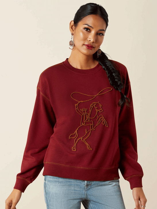 Ariat 10062799 Womens Lasso Sweatshirt Cabarnet Burgundy front view. If you need any assistance with this item or the purchase of this item please call us at five six one seven four eight eight eight zero one Monday through Saturday 10:00a.m EST to 8:00 p.m EST