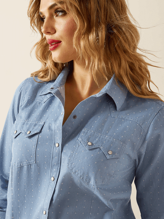 Ariat 10062840 Womens Merchant Western Shirt Light Blue front close up. If you need any assistance with this item or the purchase of this item please call us at five six one seven four eight eight eight zero one Monday through Saturday 10:00a.m EST to 8:00 p.m EST